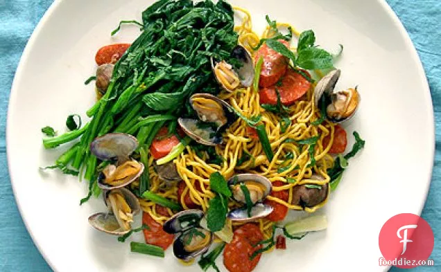 Spicy Steamed Clams with Chinese Broccoli and Pancit Noodles
