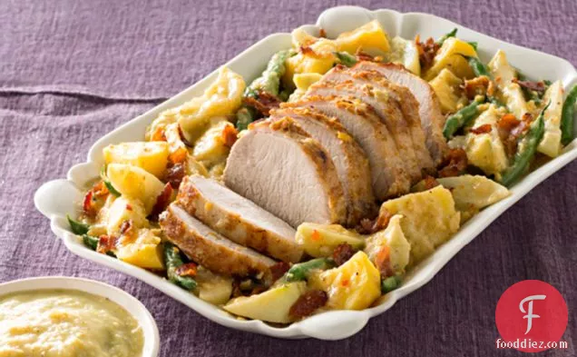 आलू, चायोट्स और हरी बीन्स के साथ हरे तिल में पोर्क