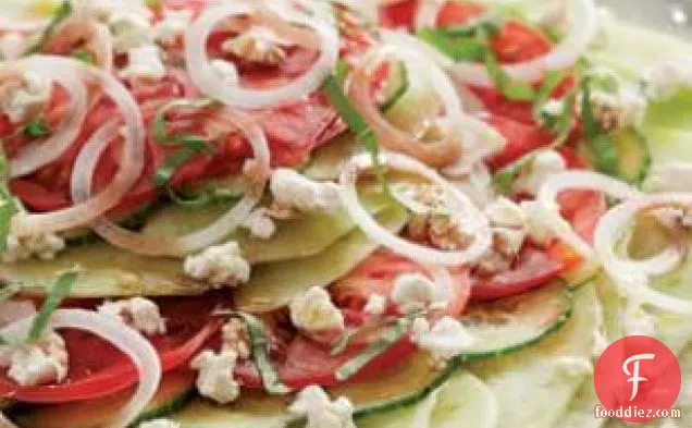 Melon, Tomato & Onion Salad With Goat Cheese