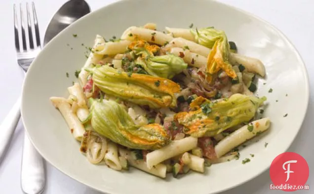 Pasta With Zucchini, Zucchini Blossoms, And Caramelized Onion