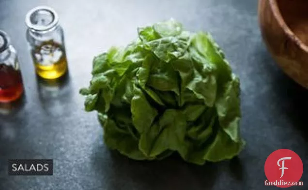 Romaine Lettuce dressed with Anchovy Puree, Crumbled Hard Boiled Egg and Toasted Whole Grain Bread Bites