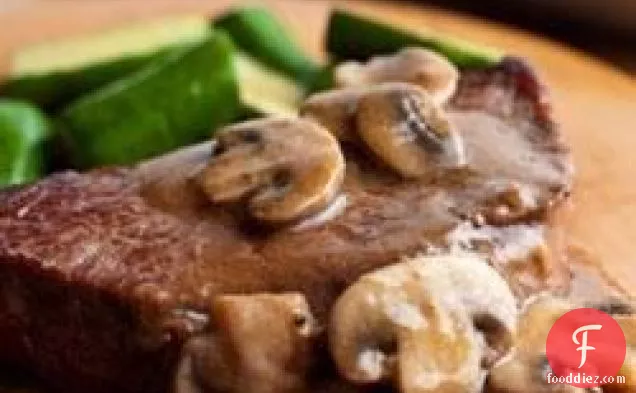 Swanson® Pan-Seared Steaks with Mushroom Gravy