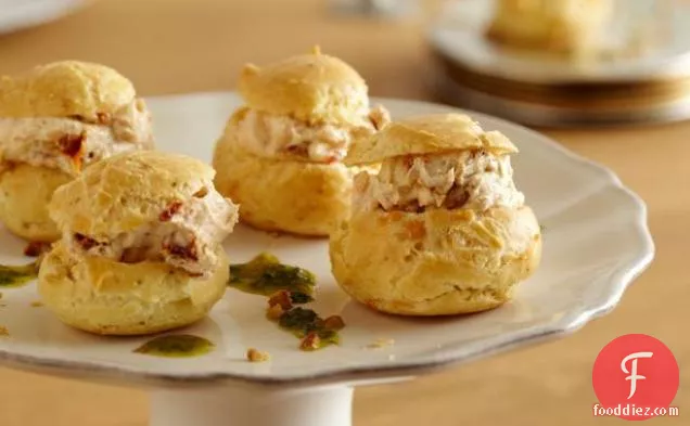 Goat Cheese and Sun Dried Tomato Profiteroles with Herb Oil