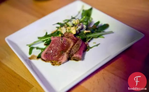 Black and Blue Lamb, Pistachio and Arugula Salad