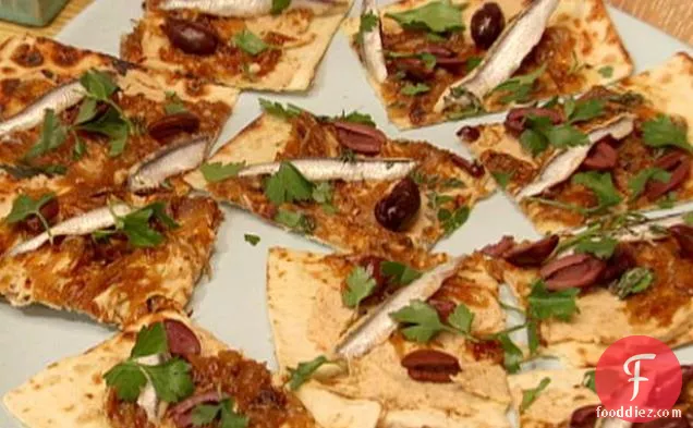 Flatbread with White Bean Hummus, Caramelized Onions, Black Olives and Spanish White Anchovies