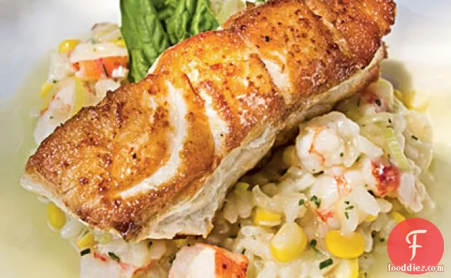 समुद्री भोजन रिसोट्टो और शैंपेन के साथ भुना हुआ ग्रूपर-साइट्रस बेउरे ब्लैंक