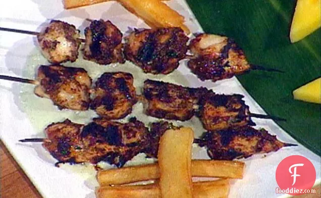 Bob Marley's Reggae: Jerk Marinated Chicken Breast Skewers, Chargrilled and Served with Creamy Cucumber Dipping Sauce and Yucca Fries