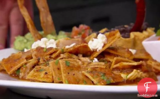 Chilaquiles Rojos (Traditional Mexican Breakfast Dish)