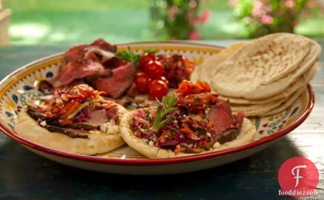 Open-Faced Pitas with Rotisserie Lamb with Pomegranate and Mint, Grilled Tomatoes, and Greek Slaw