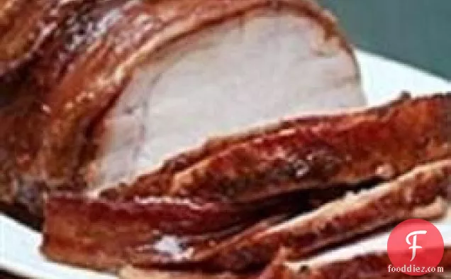 Bacon wrapped Pork Loin with Spicy Sweet Glaze