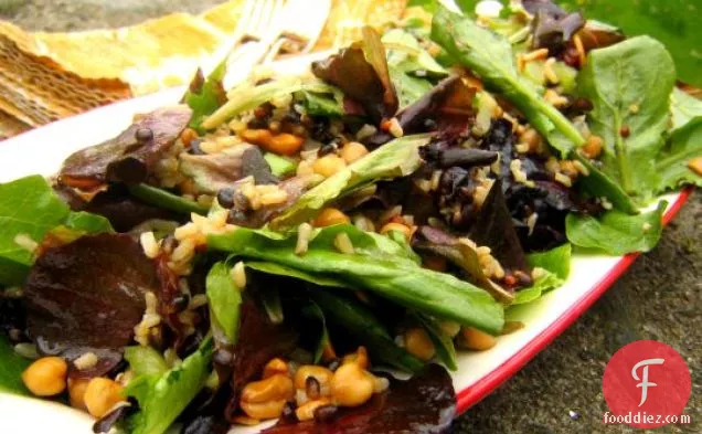 Rice And Mixed Greens Salad With Dates, Cashews, And Chickpeas