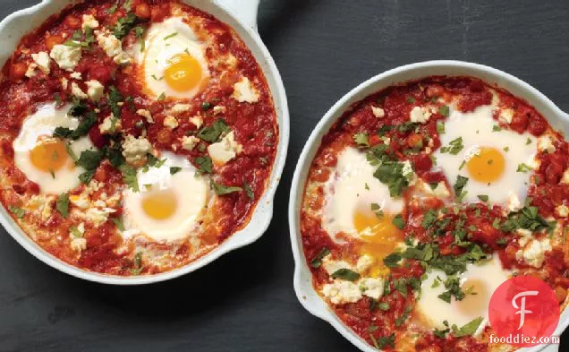 Poached Eggs In Tomato Sauce With Chickpeas And Feta