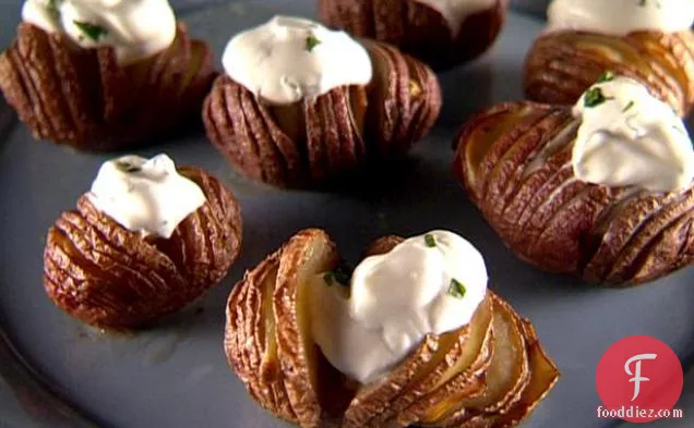 Garlic Hasselback Potatoes with Herbed Sour Cream