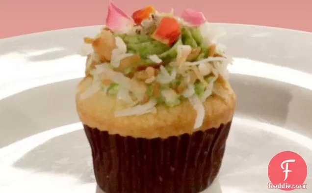 Winning Mini Coconut Cupcakes with Poppy Seed Crust, Muscat Raisin Filling, and Parsley Icing with Toasted Coconut, Flax and Poppy Seed Toffee, and Organic Roses
