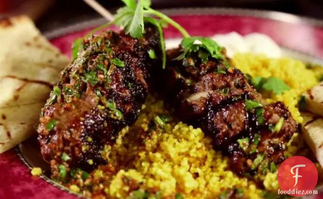 Moroccan Beef Kebabs with Curried Couscous, Raita and Charmoula Vinaigrette