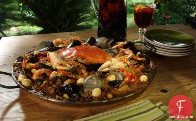 Fire Pit Paella with Portuguese Sausage, Crab and Escargot