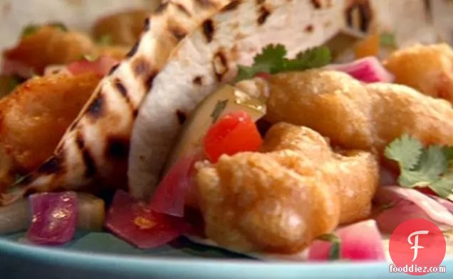 Cerveza-Battered Fish Tacos with Quick-Pickled Onion and Cucumber