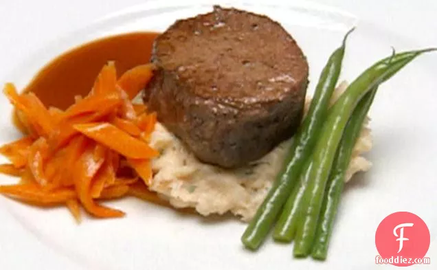 Filet Mignon over Lobster Boursin Mashed Potatoes with a Merlot Reduction