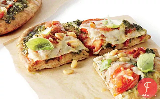 Pita Pizzas with Kale Pesto, Tomatoes, and Bacon