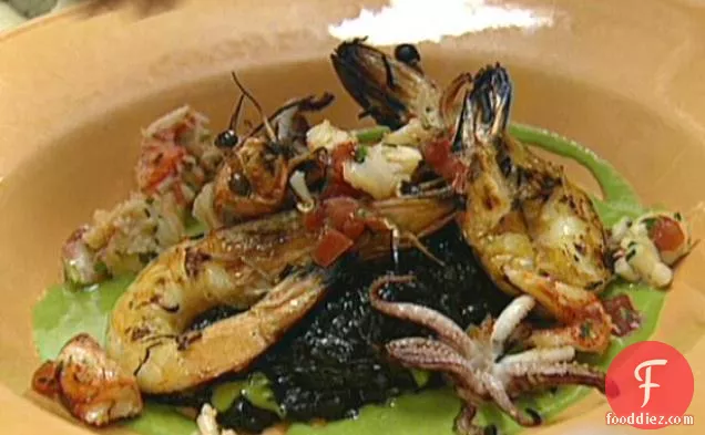 Black Squid Ink Risotto with Grilled Prawns, Lobster and Green Onion Vinaigrette