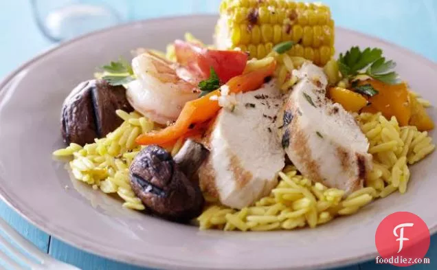 Grilled Meats and Vegetables over Saffron Orzo