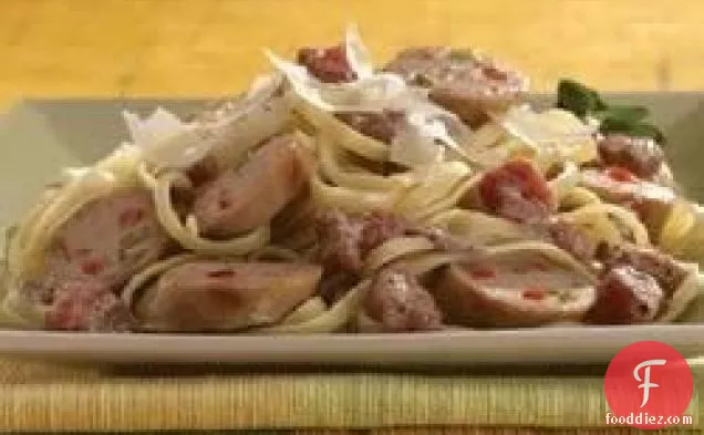 Grilled Sweet Italian Chicken Sausage with Tomato Cream Sauce Over Linguine