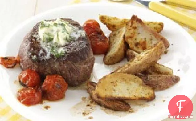 Basil-Butter Steaks with Roasted Potatoes