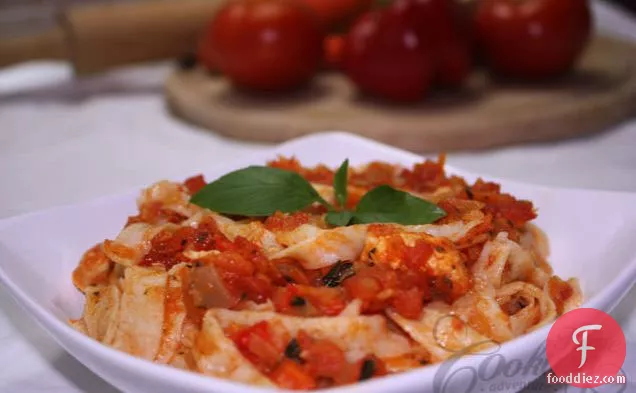 Homemade Tagliatelle With Tomato Sauce
