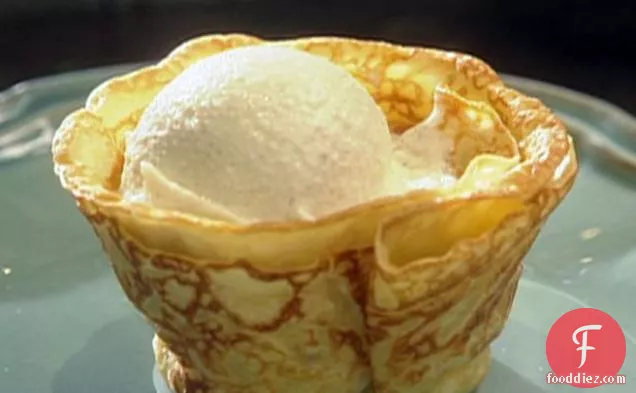 Crepes Suzette with Vanilla Ice Cream and Orange Butter Sauce