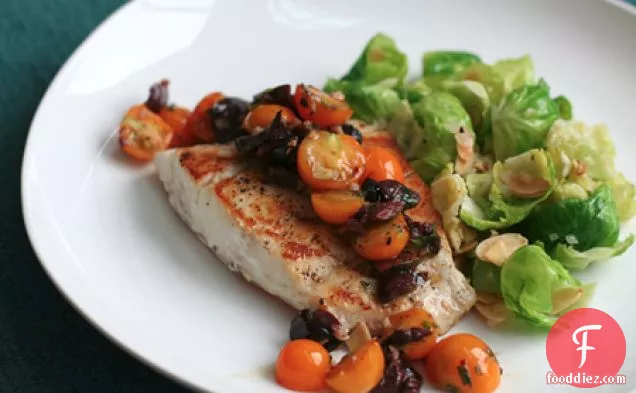 Spicy Sauteed Fish With Olives And Cherry Tomatoes
