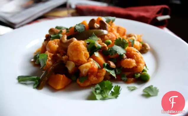 Dinner Tonight: Cauliflower and Sweet Potatoes in Spicy Tomato Sauce with Cashews