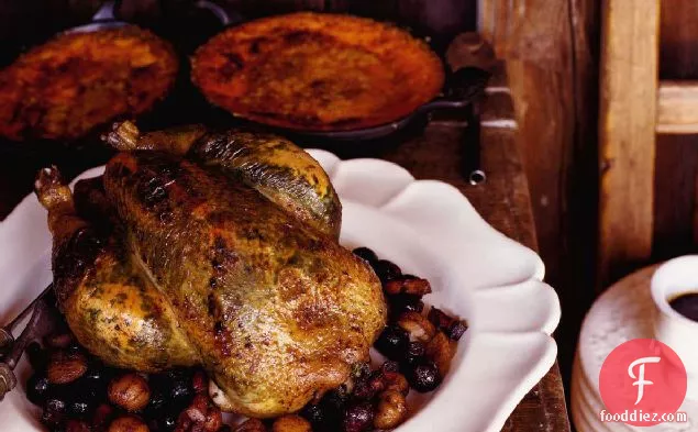 Roast Chicken with Grapes, Chestnuts and Tarragon Butter