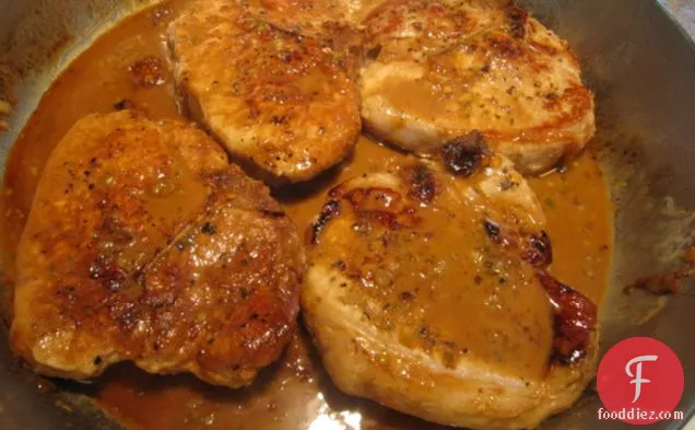 Pork Chops With Flaming Apricot Bourbon Sauce