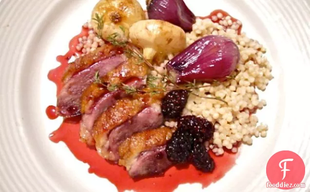 Crispy Duck with Blackberry Gastrique, Roasted Pearl Onions, and Israeli Cous-Cous