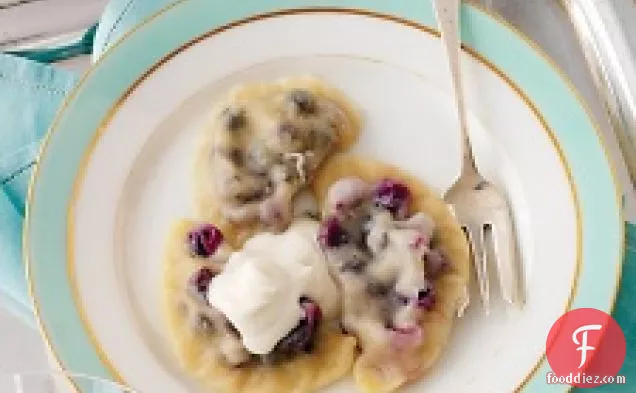 Pierogi With Blueberry Filling And Spiced Sour Cream