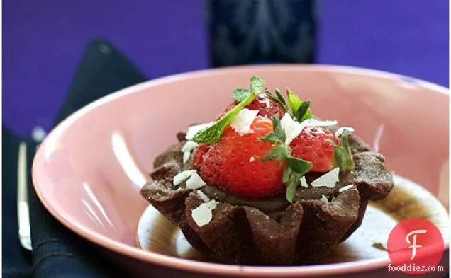Dark Chocolate Tartlets With Strawberries And Coconut Shaves