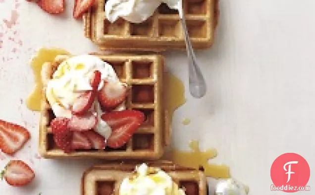Whole-grain Waffles With Sliced Strawberries And Yogurt