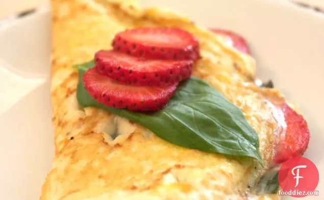 Omelette With Brie Cheese, Basil And Strawberries