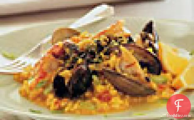 Mussels, Clams and Shrimp with Saffron Risotto and Green Olive Relish