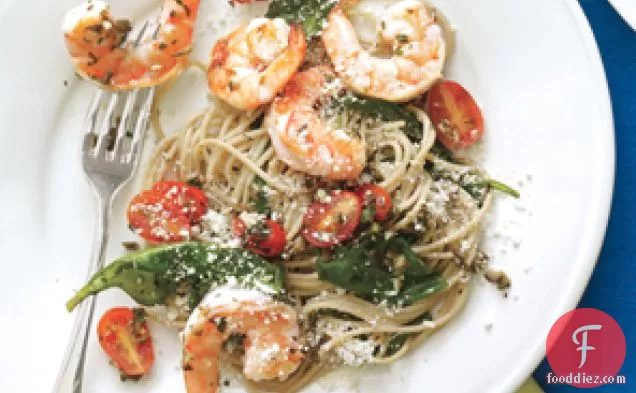 Shrimp Scampi With Pasta, Spinach, Cherry Tomatoes And Olives