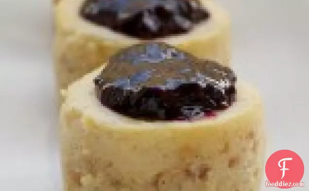 Vanilla Bean Mini Cheesecakes with Blueberry Sauce