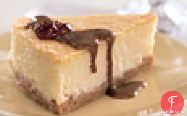 Mascarpone Cheesecake with Candied Pecans and Dulce de Leche Sauce