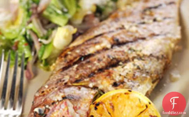 Grilled Whole Snapper With Escarole And Preserved Lemons