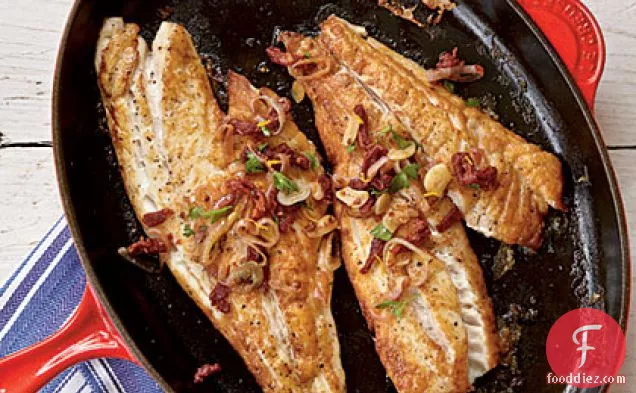 Pan-Roasted Snapper Fillets with Sun-Dried Tomatoes and Garlic