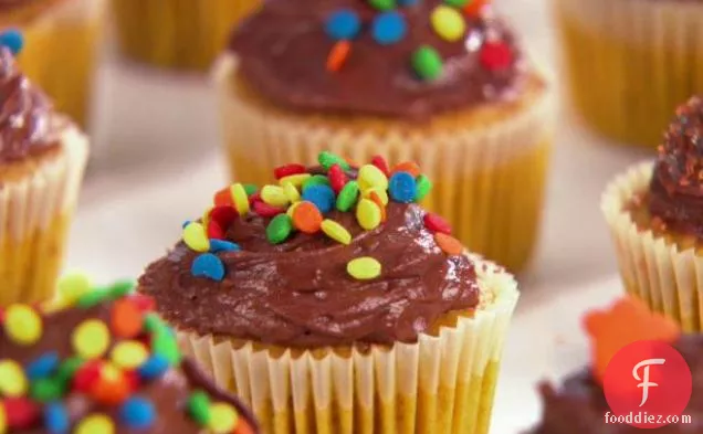 Mini Pumpkin Cupcakes with Chocolate Frosting