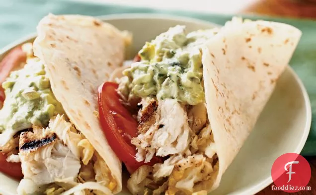 Fish Tacos with Creamy Lime Guacamole and Cabbage Slaw