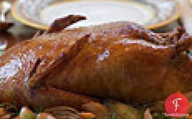 Slow-Roasted Duck with Olive Gravy and Garlic-Fennel Confit