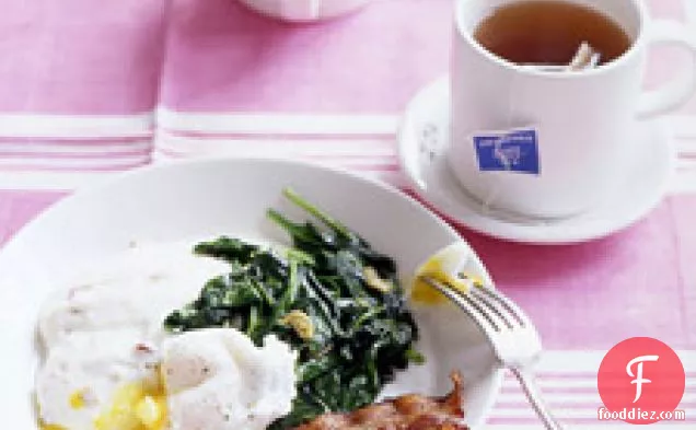 Poached Eggs With Bacon Grits And Wilted Spinach