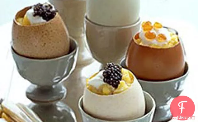 Scrambled Eggs With Creme Fraiche And Caviar In Eggshell Cups