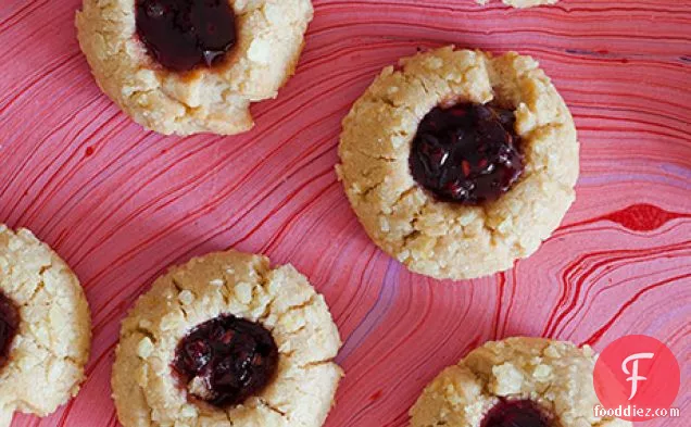 Peanut Butter And Jelly Thumbprint Cookies Rolled In Crushed Po